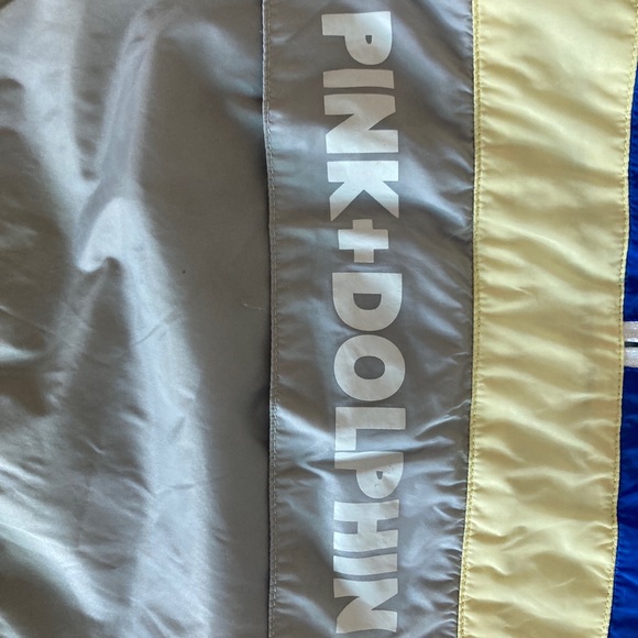 This is a tight fitting, gently used XL Pink+Dolphin Windbreaker. - Picture 4 of 5